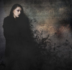 Gothic young with long black cape, fantasy