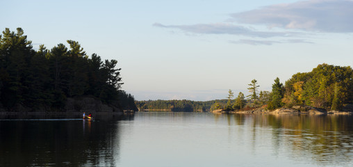 Fototapeta na wymiar Canoeing on a Northern Lake