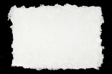 white handmade paper on black background