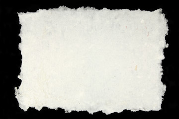 white handmade paper on black background