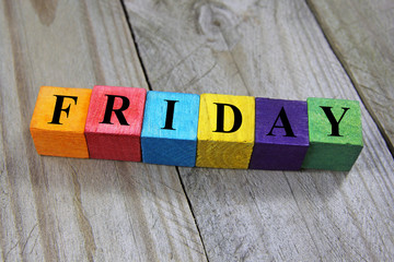 concept of friday word on wooden colorful cubes
