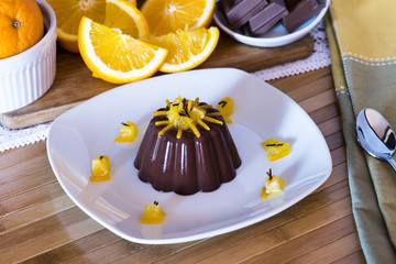 Delicious chocolate dessert with orange and cocoa