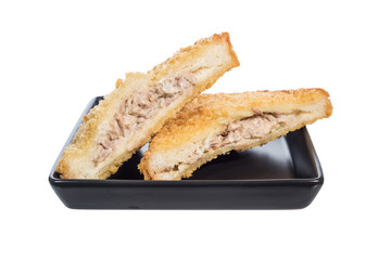 fried tuna sandwich in ceramic plate