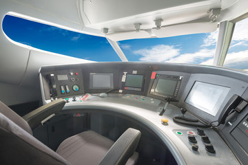 plane cockpit and cloudy sky