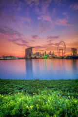 Fototapete Stadt am Wasser Skyline von Singapur bei Sonnenuntergang