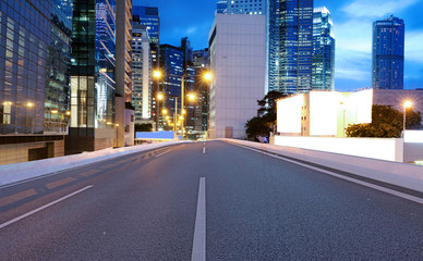 Asphalt road and modern city