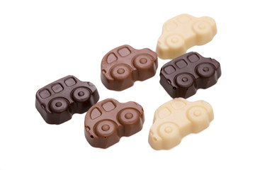 Assortment of chocolate cars, isolated on white