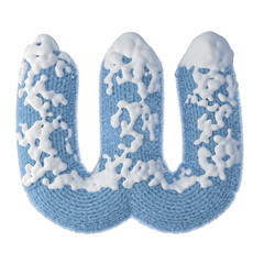 W letter made of wool covered  with snow