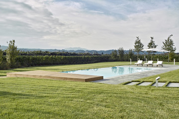 exterior view of a garden with swomming pool