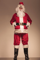 Santa Claus holding his black belt
