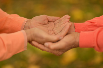 Hands held together