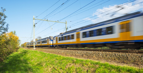 Obraz premium Passenger train moving at high speed