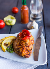 chicken fillet baked in spices and tomatoes, vegetables