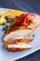 incision baked chicken in a spicy curry sauce with vegetables