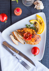 incision baked chicken in a spicy curry sauce with vegetables