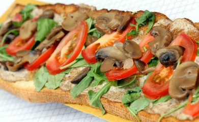 Italian bruschetta with Arugula and tomato mushrooms