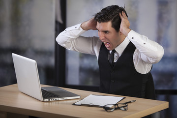 businessmen in office shouting from stress