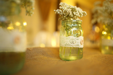 Flower arrangmnet, glass jar, at wedding,