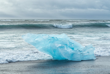 Detial view of iceberg on ocean shore, Iceland.