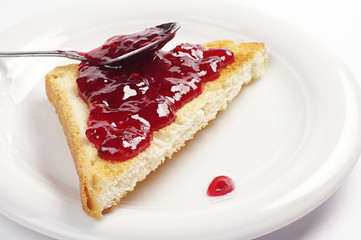 Toast bread with raspberry jam