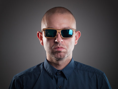 Man with sunglasses in a studio shot