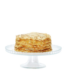 Fried fragrant, delicious pancakes on a glass stand.