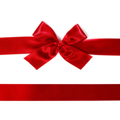 Red satin bow ribbon on white