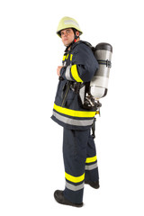 Fototapeta premium Fireman in uniform isolated in white