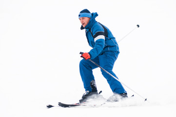 Fototapeta na wymiar A skier descends from the mountain