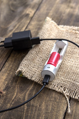 Battery charger with battery © librakv