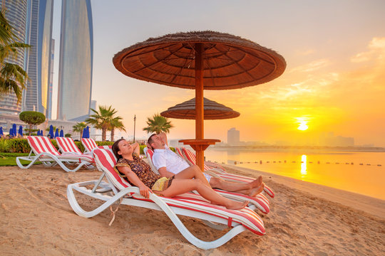 Couple on sun holidays at the Persian Gulf, Abu Dhabi