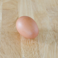 Fresh Egg on wood table