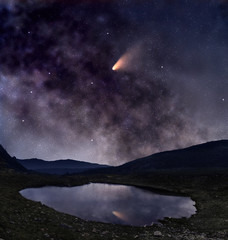 Fototapeta na wymiar Comet over mountain lake