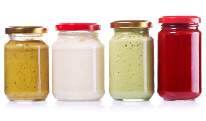 jars of preserved mustard, ketchup, horseradish