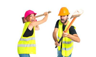 Workman with ax over white background