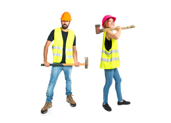 Workman with ax over white background