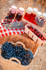 Juice, berries and lavender in a straw basket.
