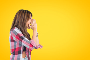 Girl shouting over isolated yellow background