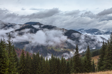 global warming. mountain landscape. Clouds and fog