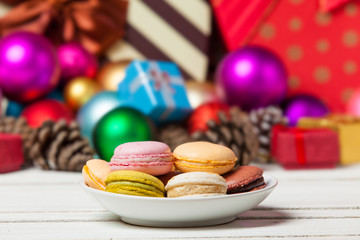 Macaron near christmas toys.
