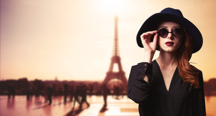 Girl with sunglasses and Parisian background