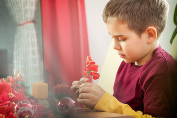 Happy young family getting ready for the Advent, Christmas holid