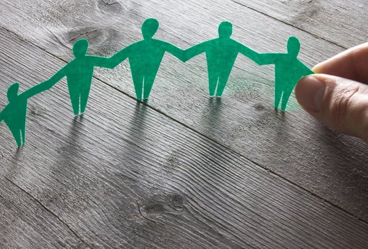 Teamarbeit / Solidarität Konzept - Menschenkette