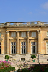 Fototapeta na wymiar Marie Antoinette estate in the parc of Versailles Palace