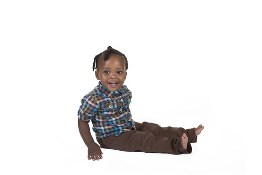 Happy toddler isolated on a white background