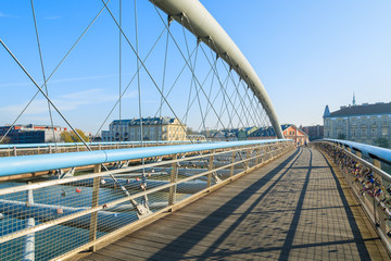 Bernatka bridge over Vistula river on sunny day, Krakow, Poland