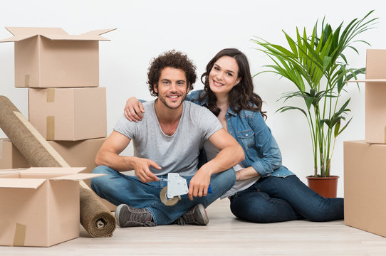 Young Couple Moving To New House