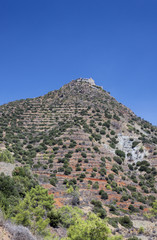 A monastery sits on top of a hill in Cyprus