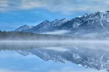 Fototapeta na wymiar Karwendel mountains reflected in Barmsee lake