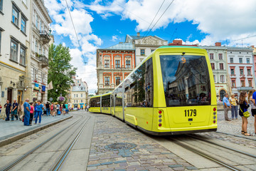 Fototapeta na wymiar Old tram is in the historic center of Lviv.
